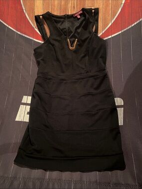Women’s Black Sleeveless Cocktail Dress with V-Neck Accent